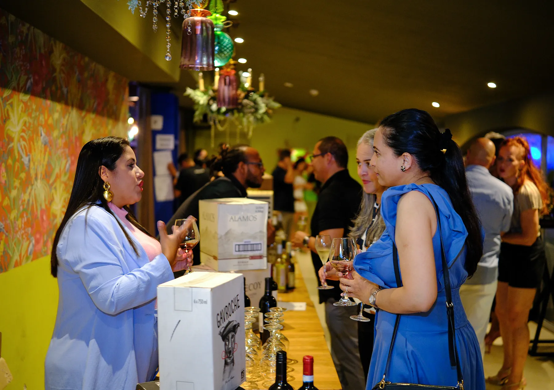 Guests enjoying a wine tasting at Wine Extravaganza
