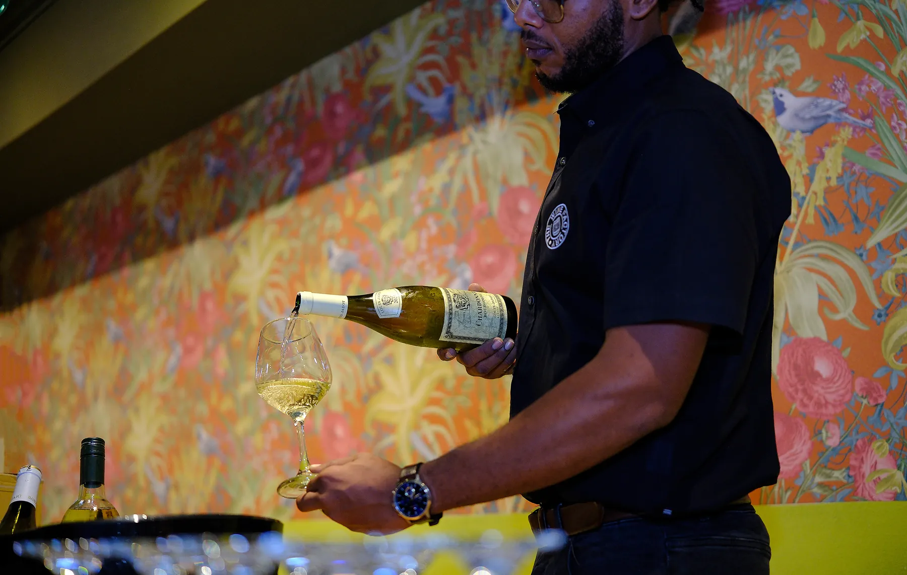 Wine being poured during Wine Extravaganza
